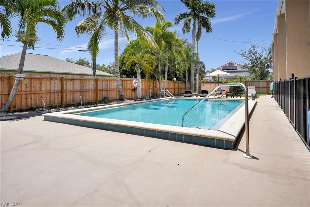 a view of a backyard with a patio