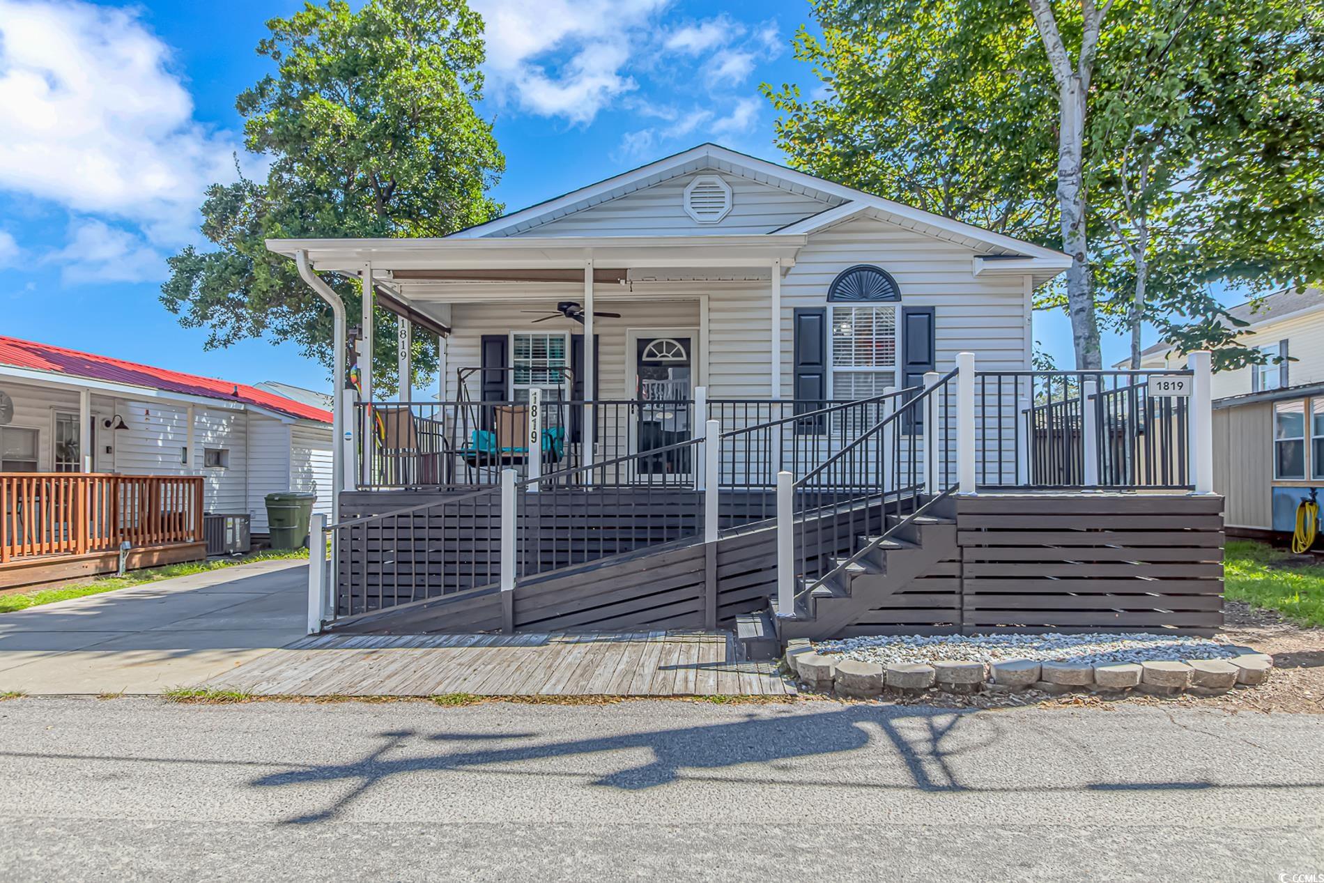 View of front of property with a porch