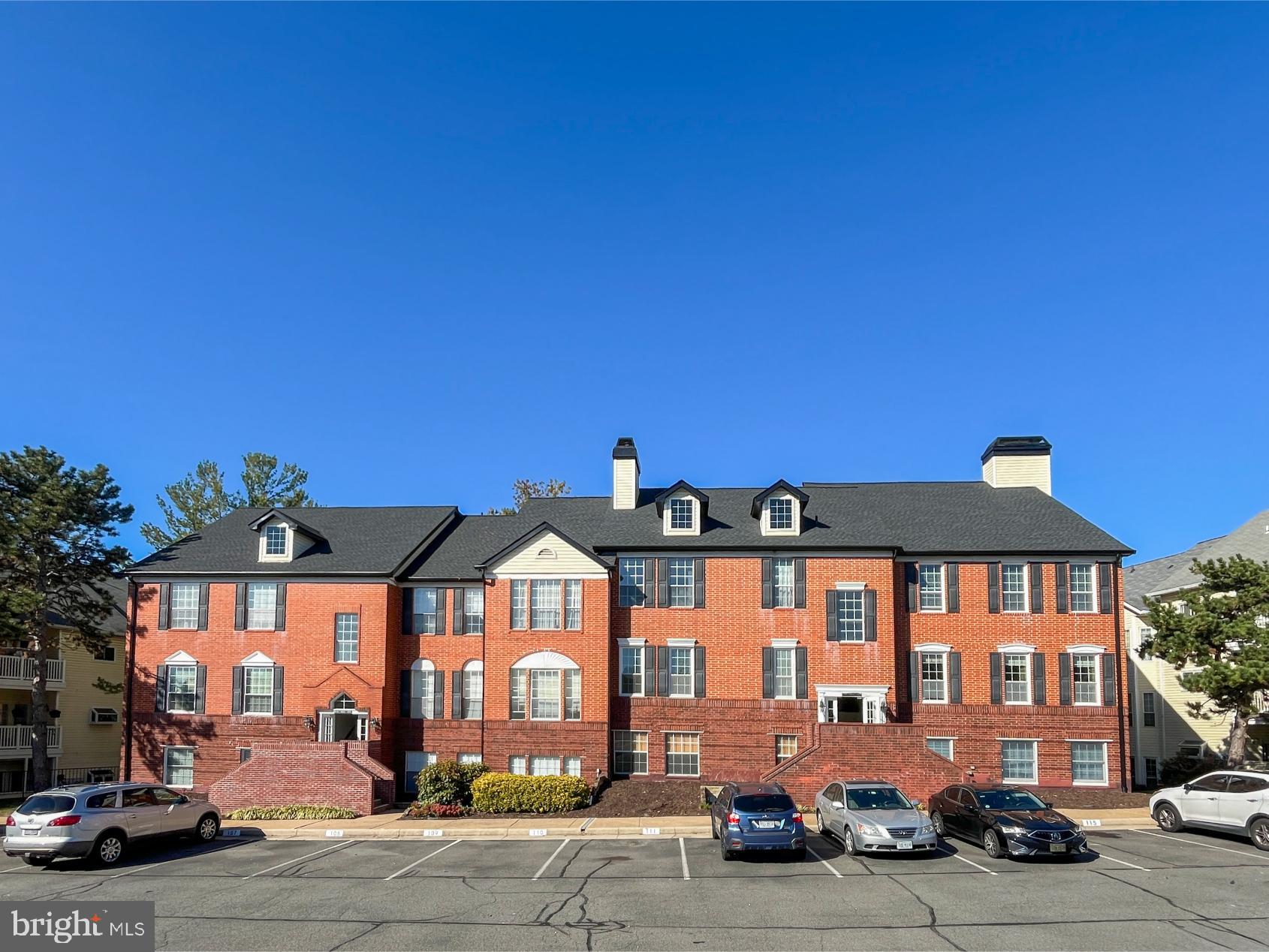 a front view of a building with large windows