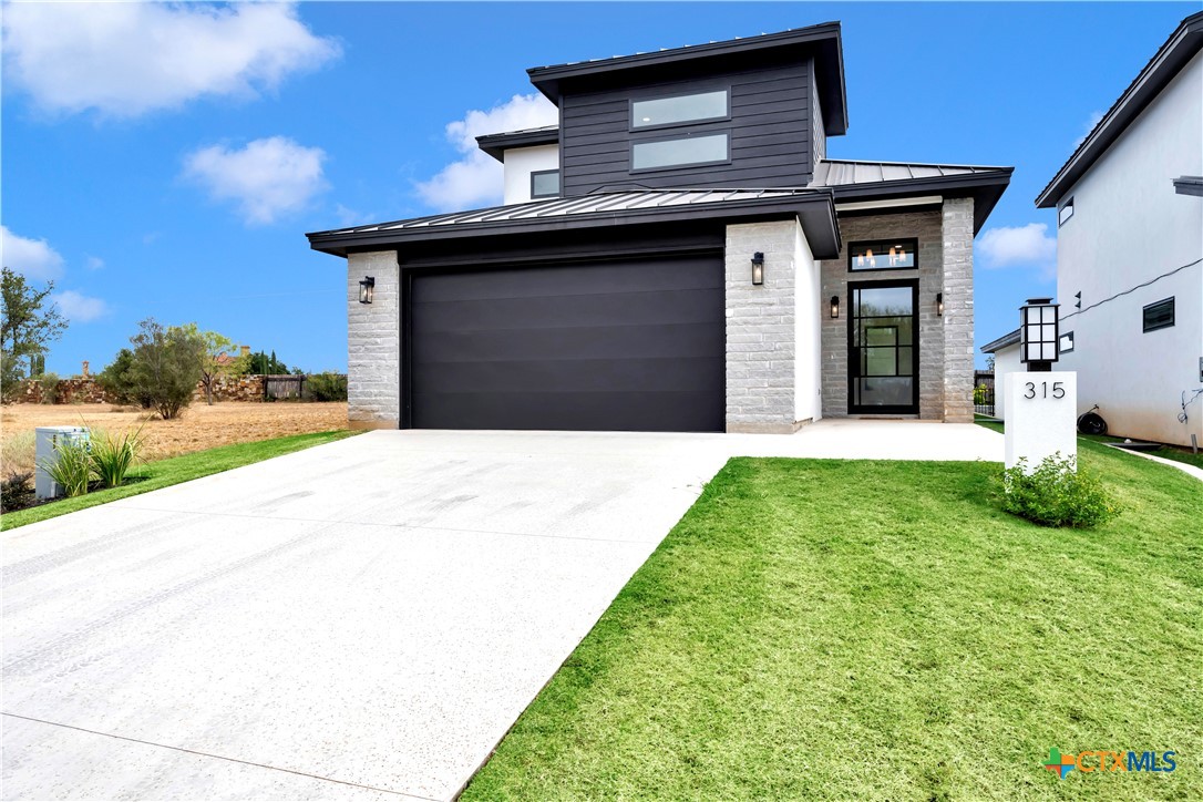 a house view with a garden space