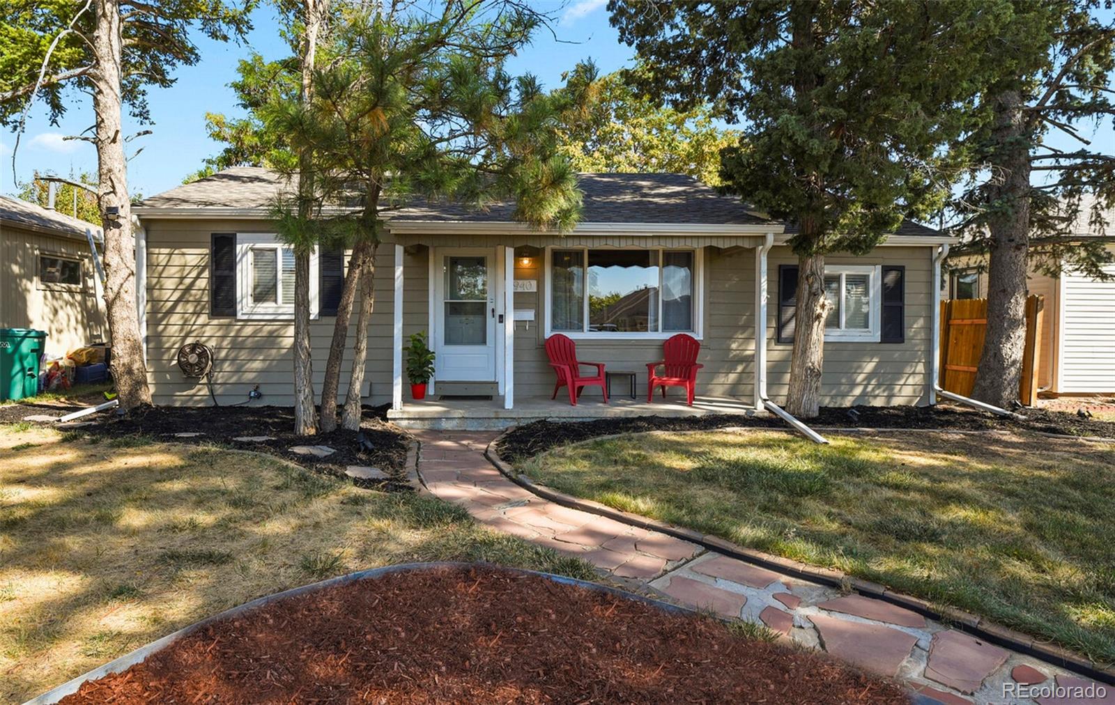 a view of house with outdoor seating