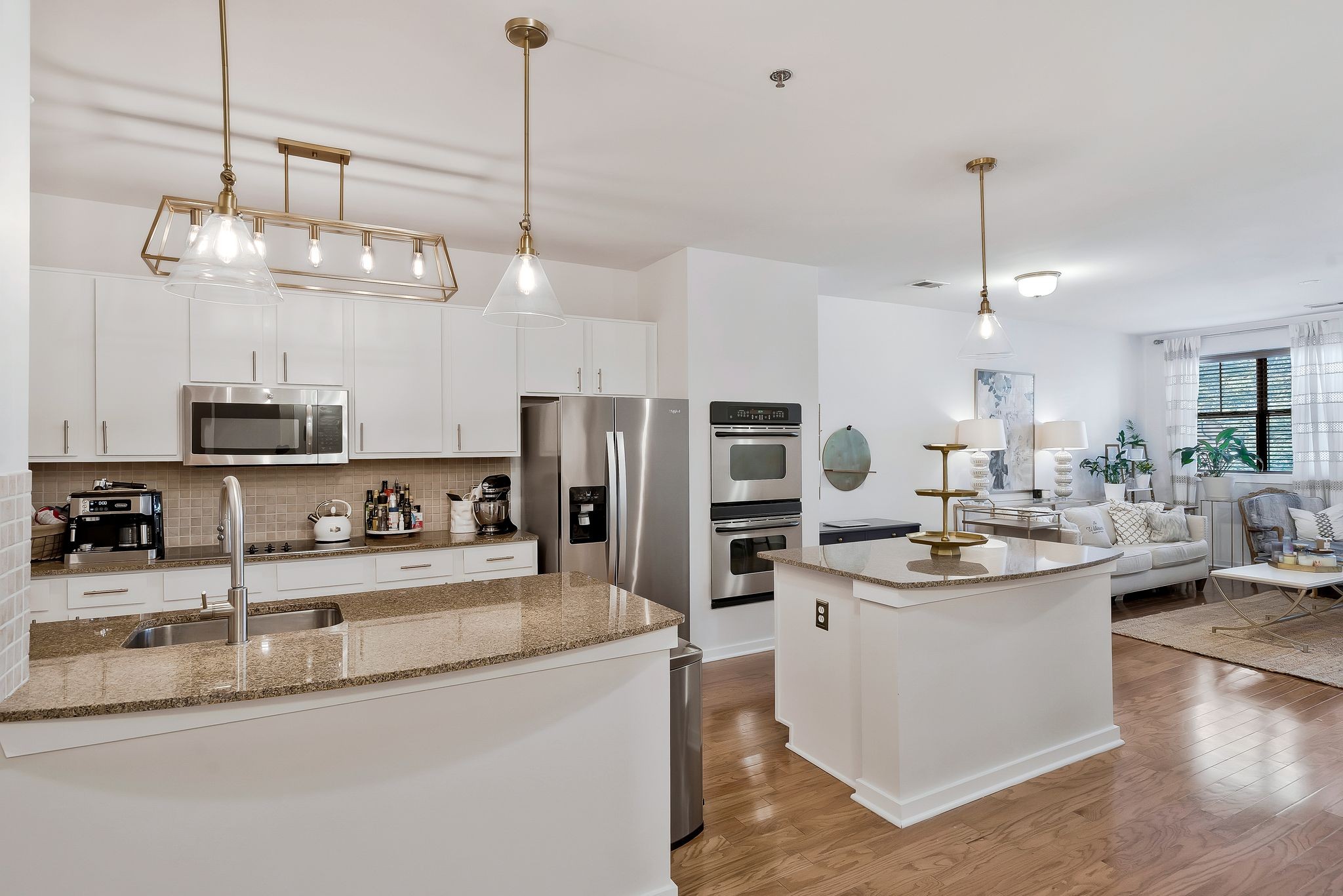 a kitchen with counter top space and appliances