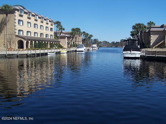 a view of a lake with building in front of it