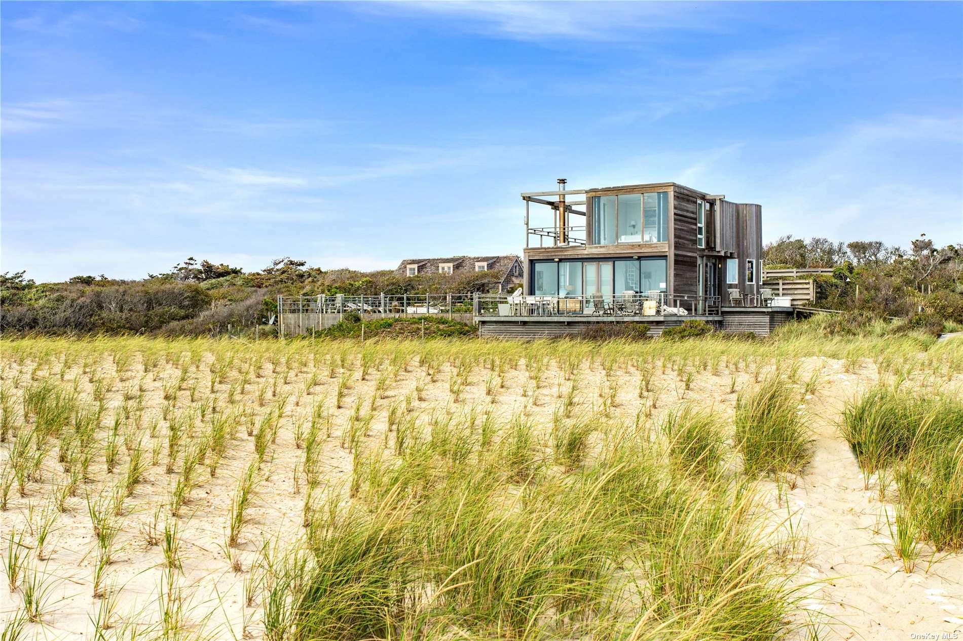 a view of a swimming pool with an ocean view