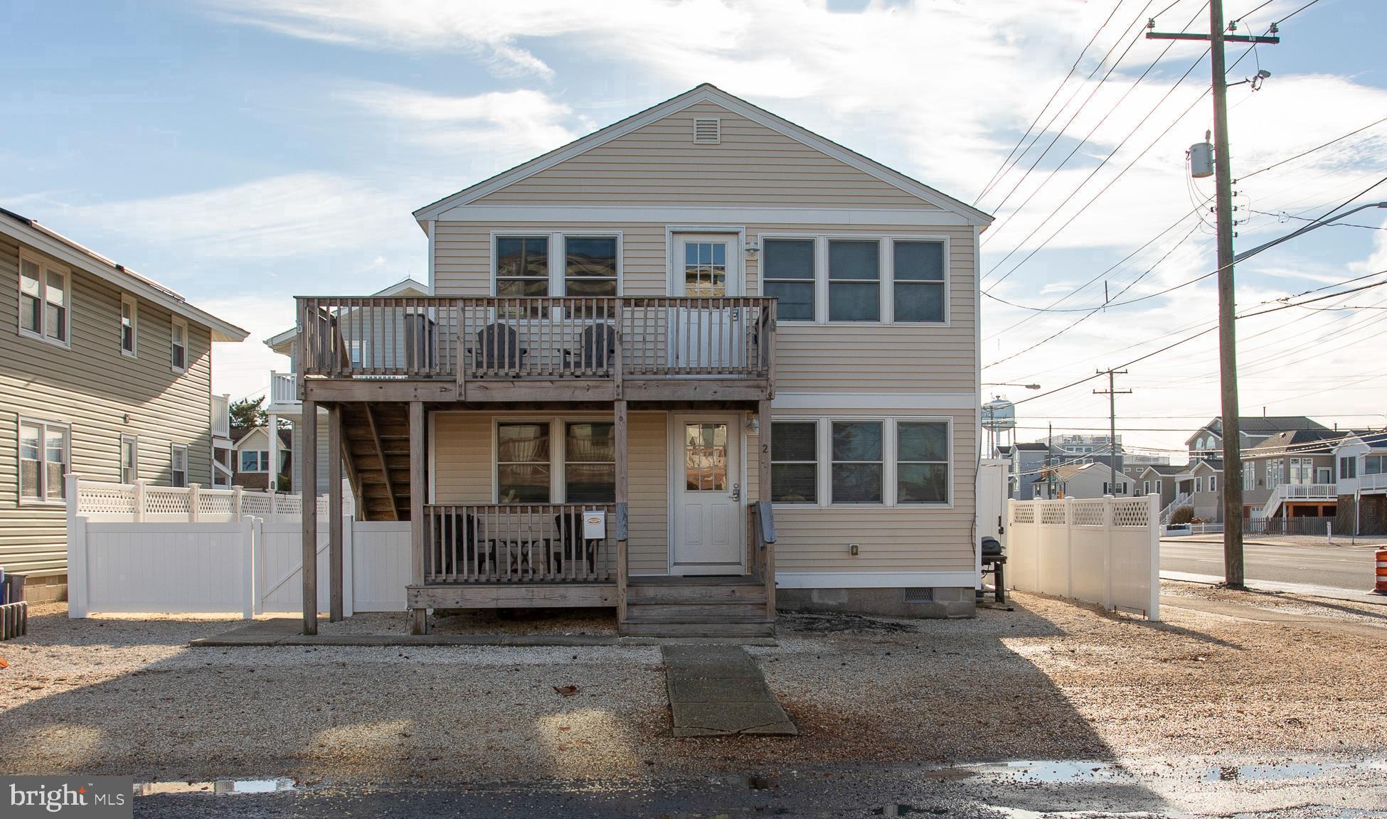 a front view of a house with a garage