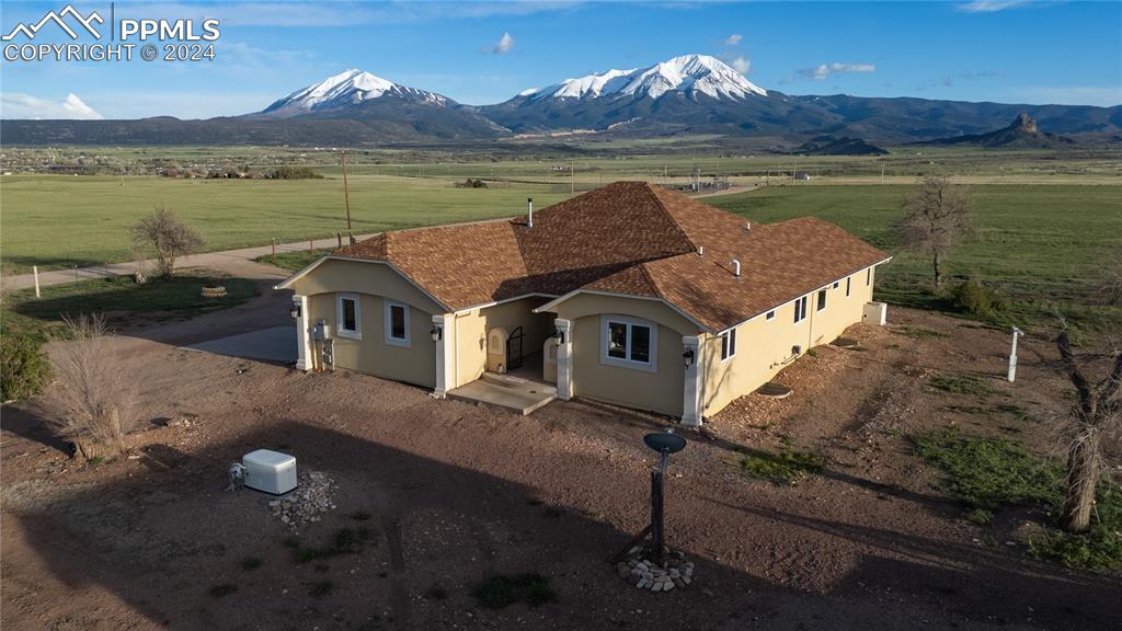 a aerial view of a house with a lake view