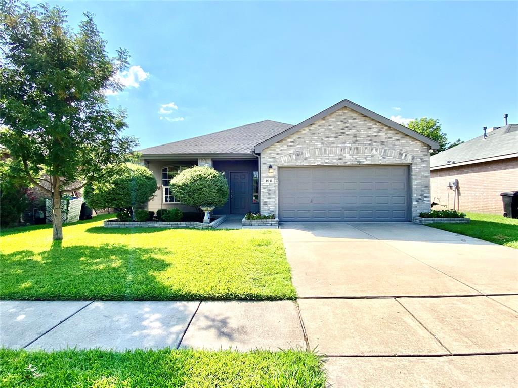 a front view of house with yard