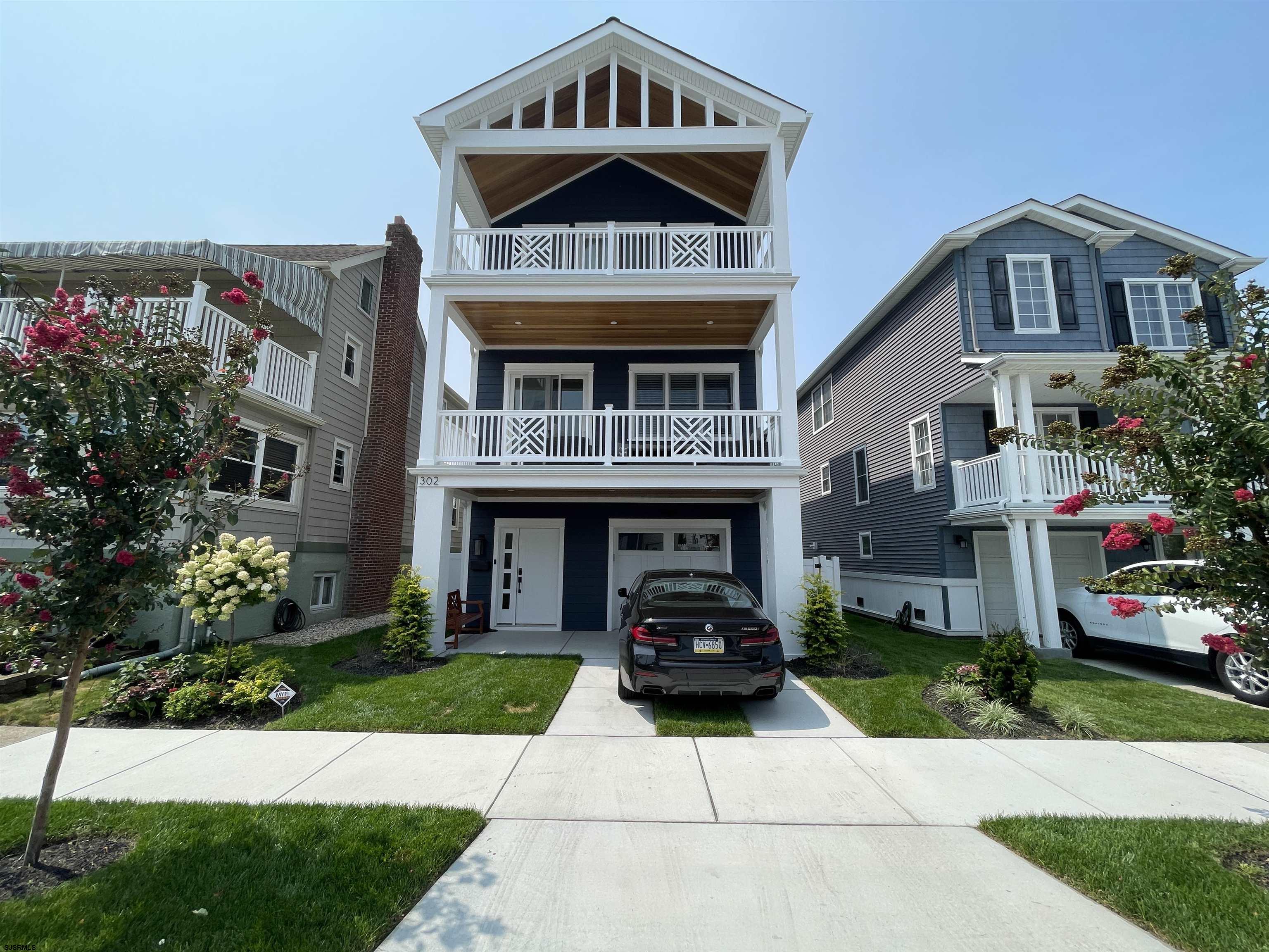 a front view of a building with garden