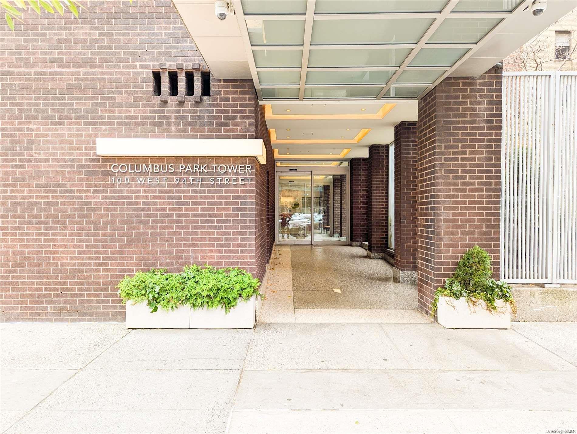 a view of a pathway along the building