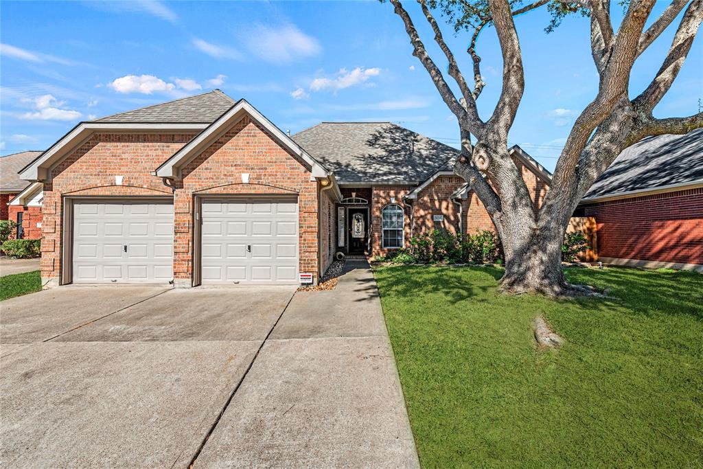 Welcome home to 5158 Weiman Dr in the Heritage Park community in Katy! Mature trees and striking curb appeal combine to create a welcoming atmosphere.