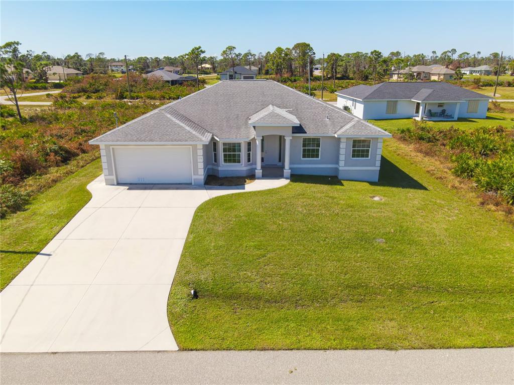 a aerial view of a house with a garden