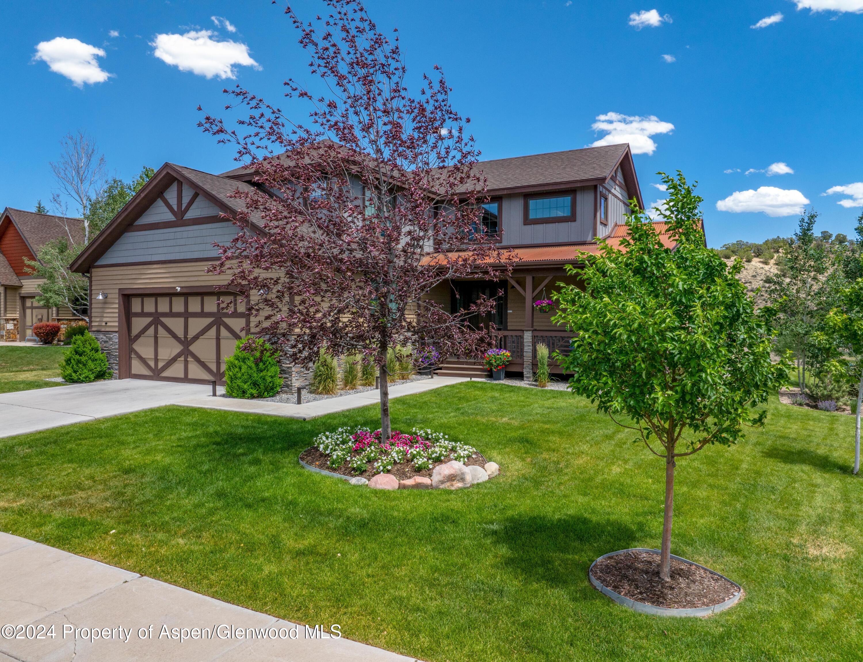 a house view with a garden space