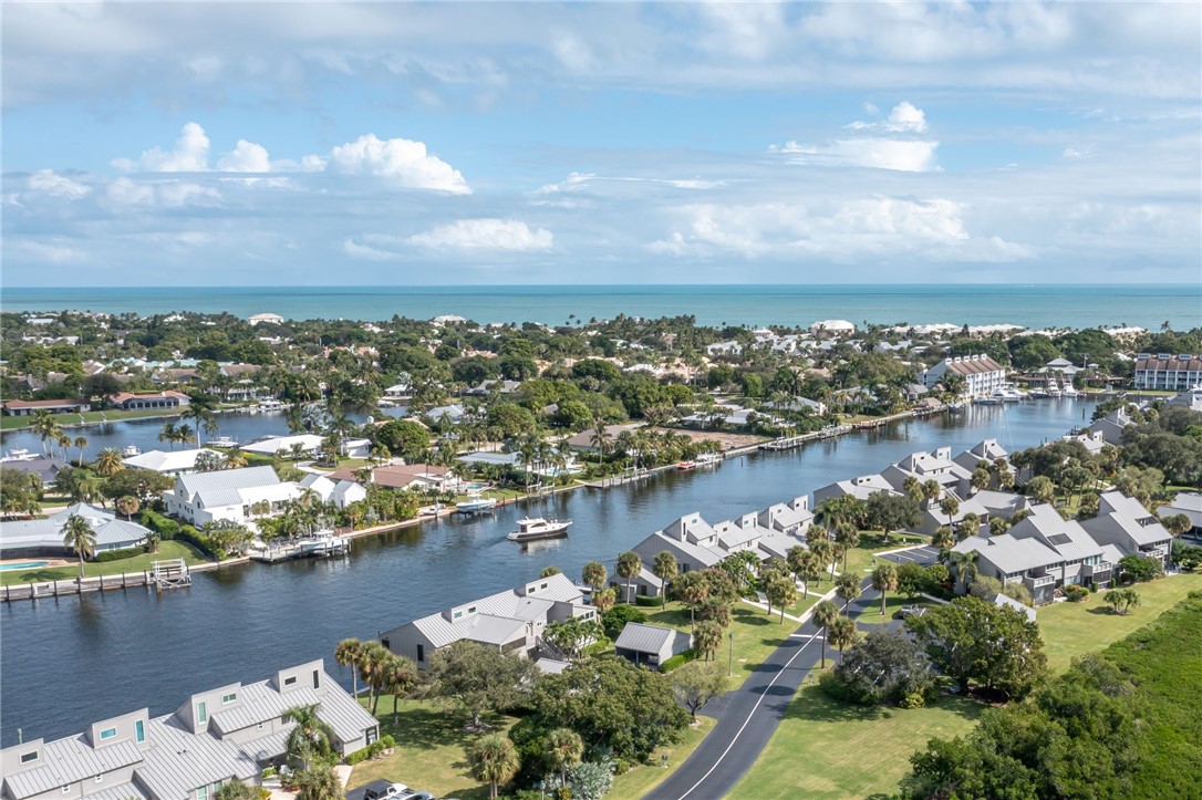 an aerial view of a city with lake view