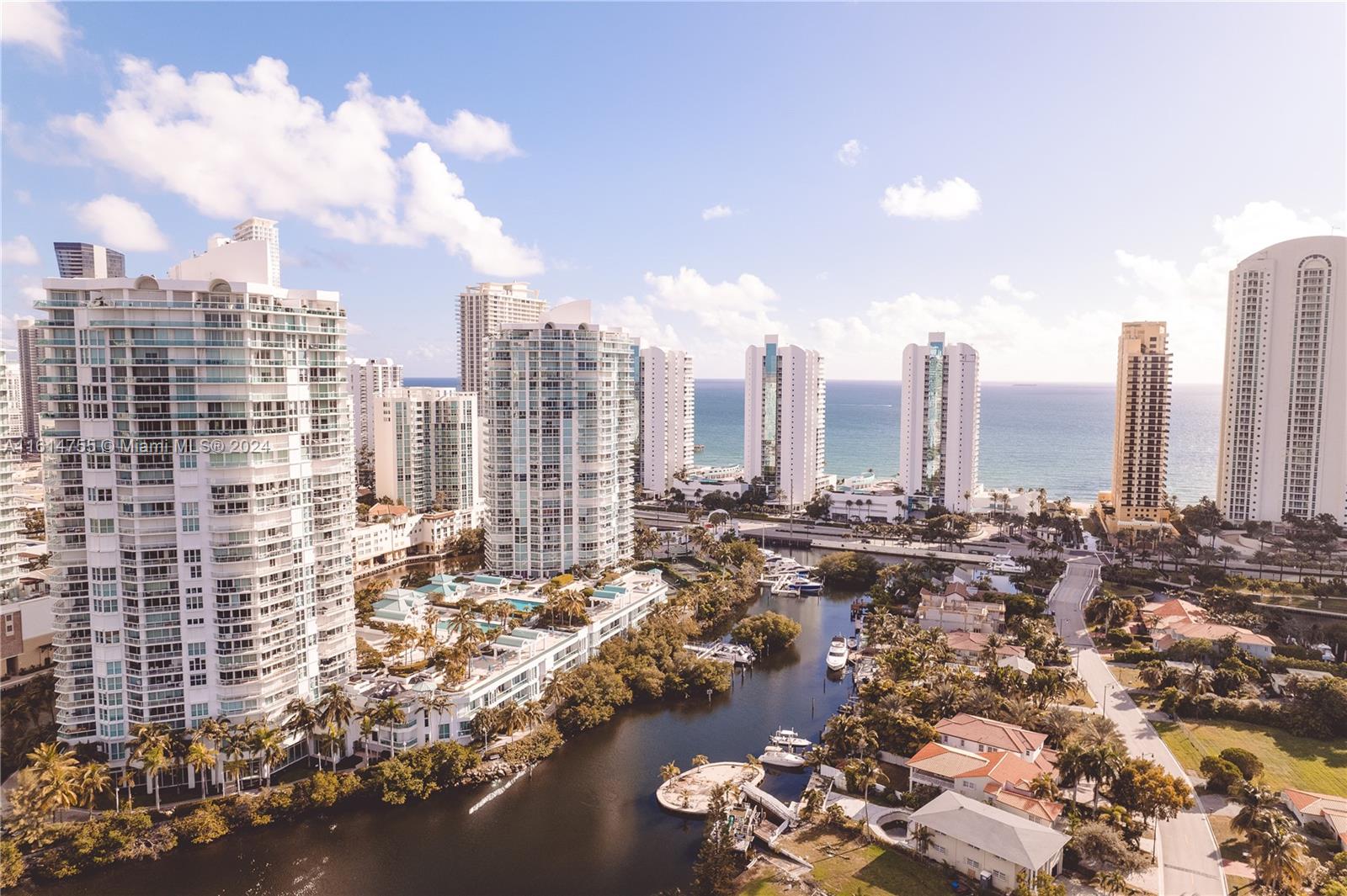 a view of a city with tall buildings