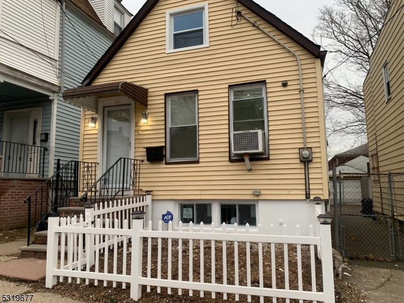 a view of a house with a deck