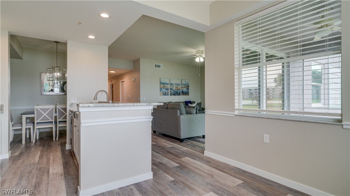 a room with furniture and a wooden floor