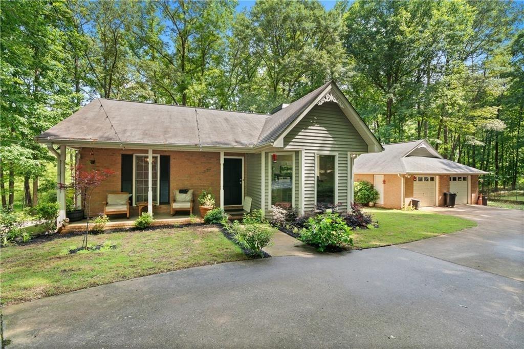 front view of a house with a yard