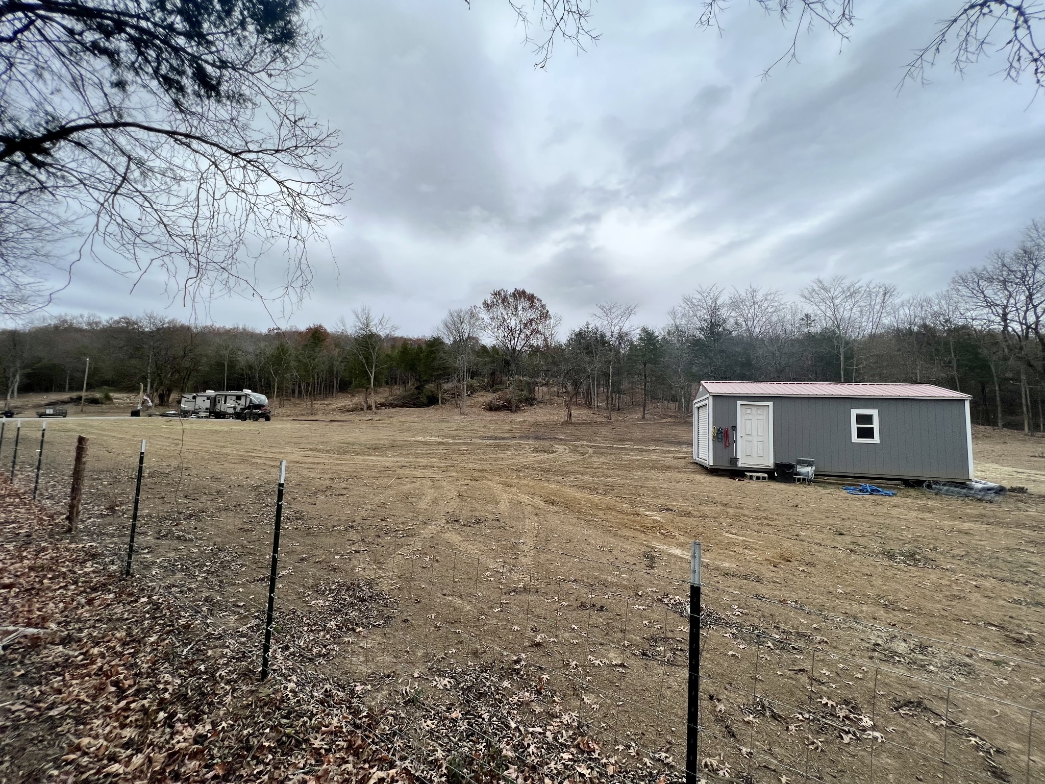 a view of a lake with a yard