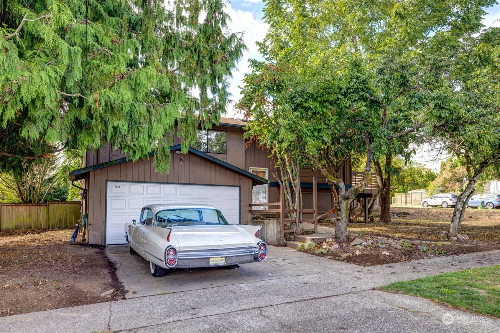 a car parked in front of a house