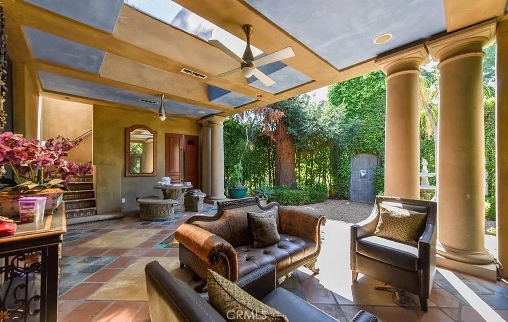 a outdoor living space with furniture and garden view