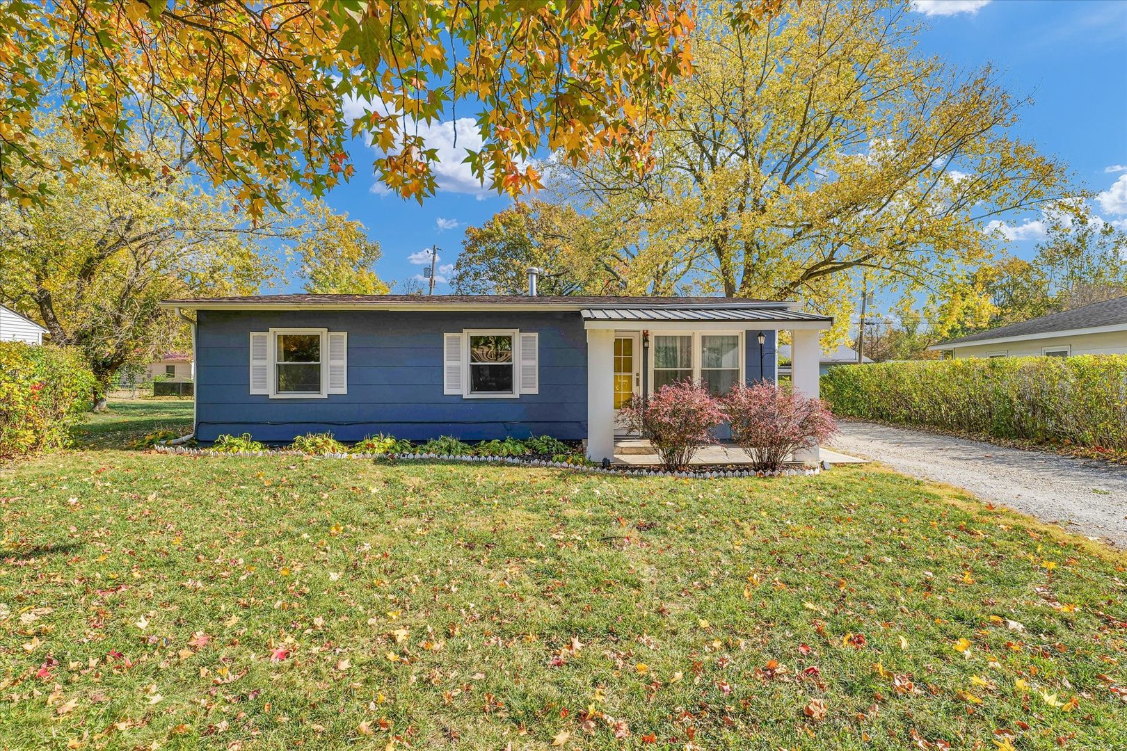 front view of a house with a yard