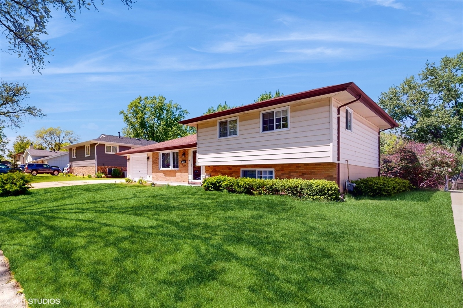 a house view with a garden space