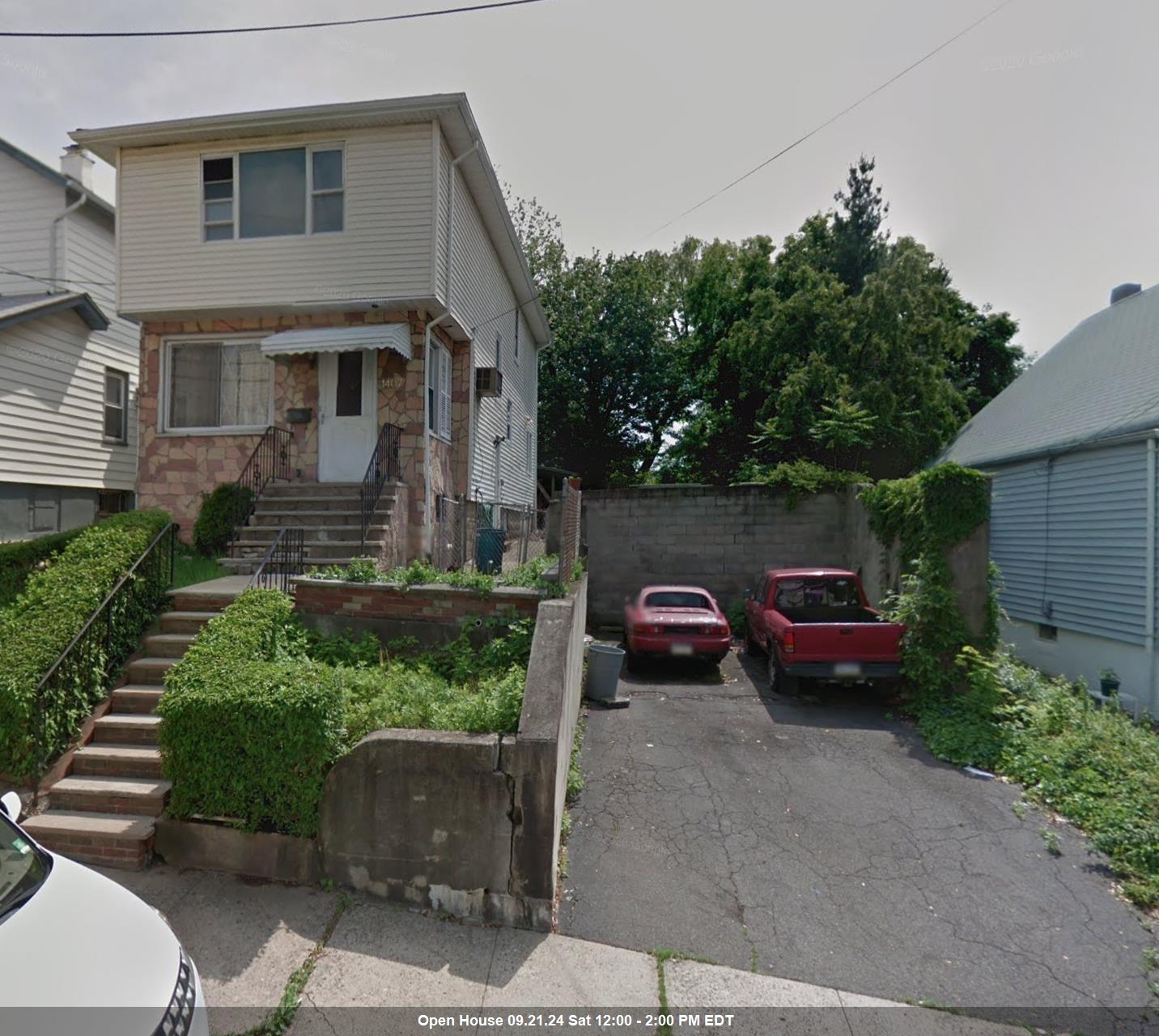 a view of house with outdoor space and street view