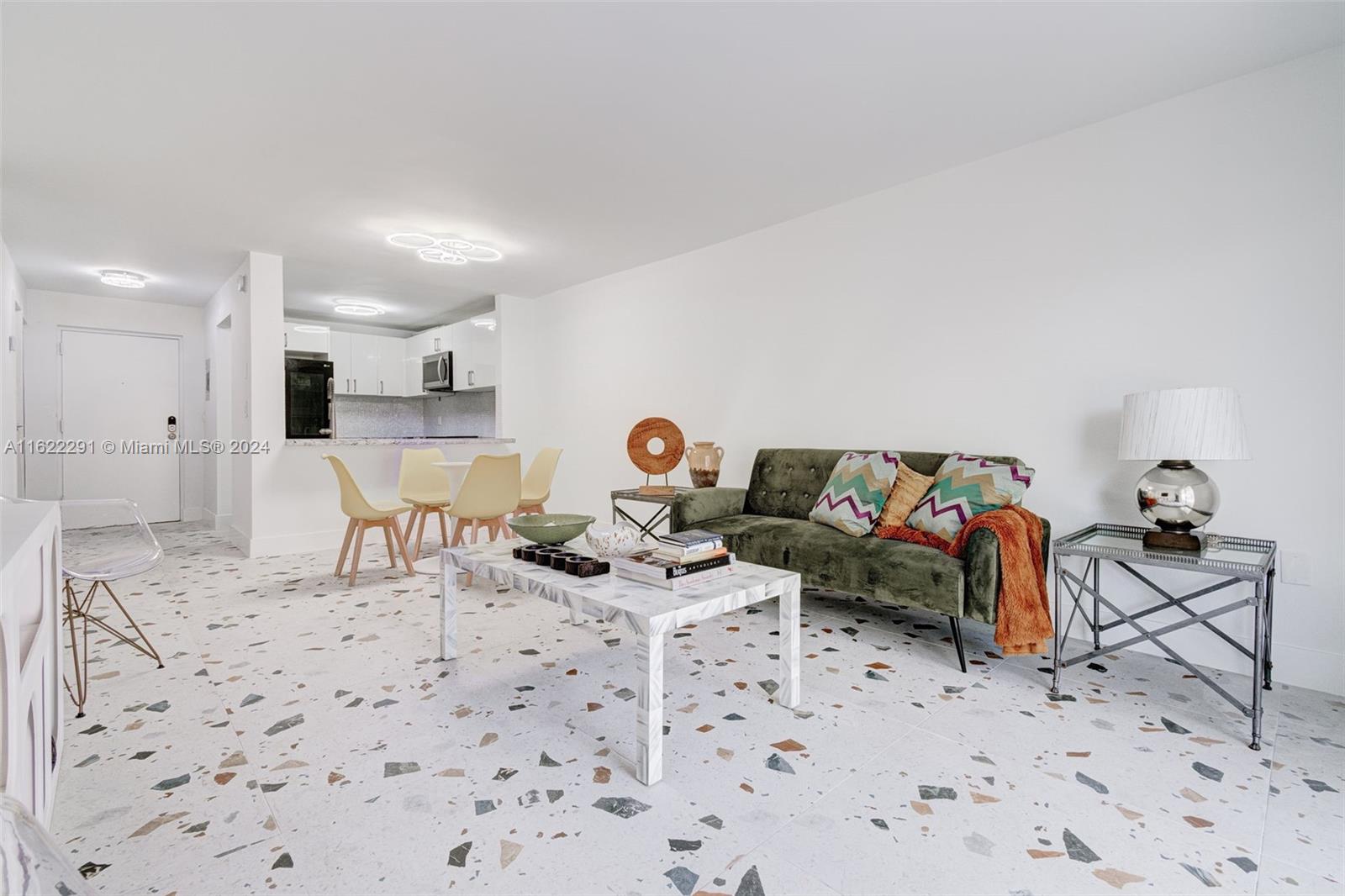 a living room with furniture and a couch