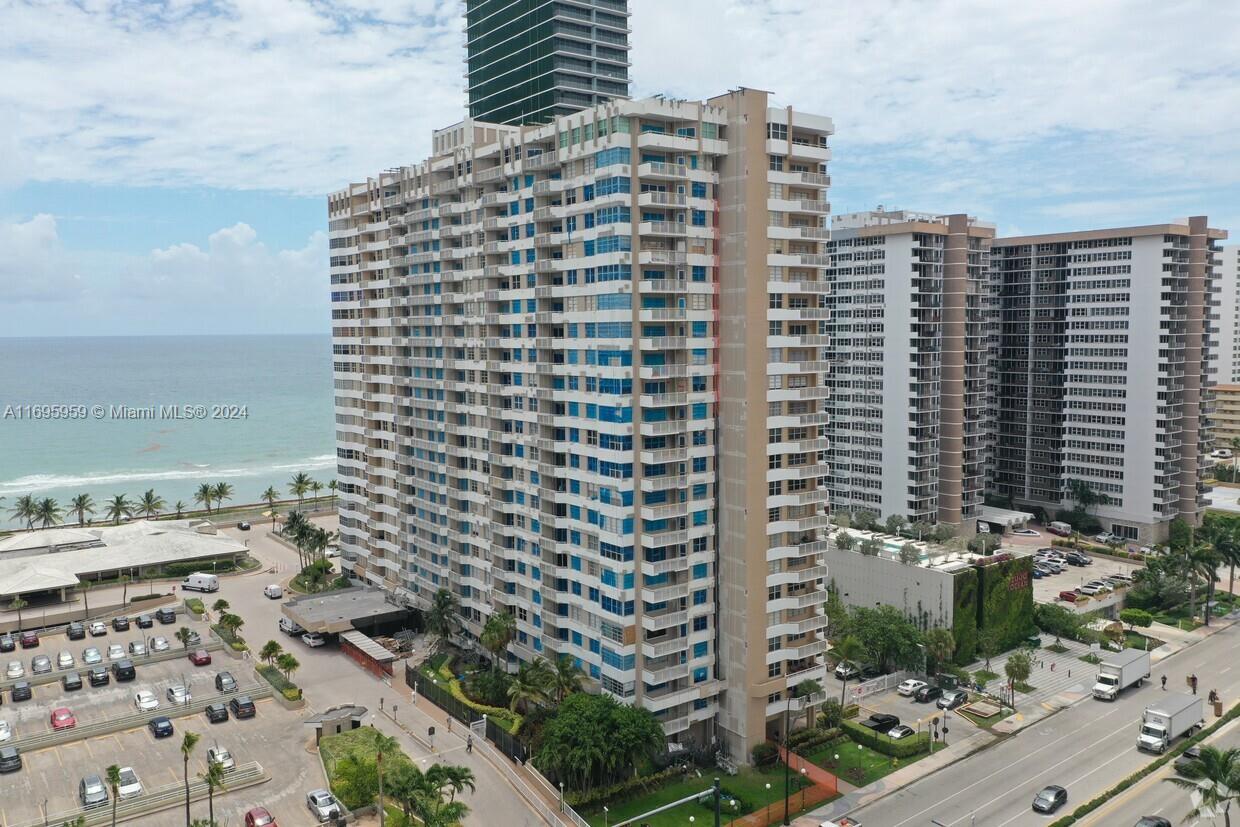 a view of a city with tall buildings