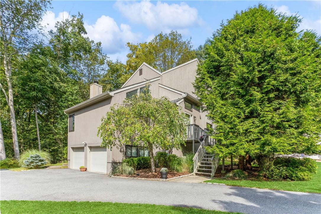 View of home's exterior featuring a garage