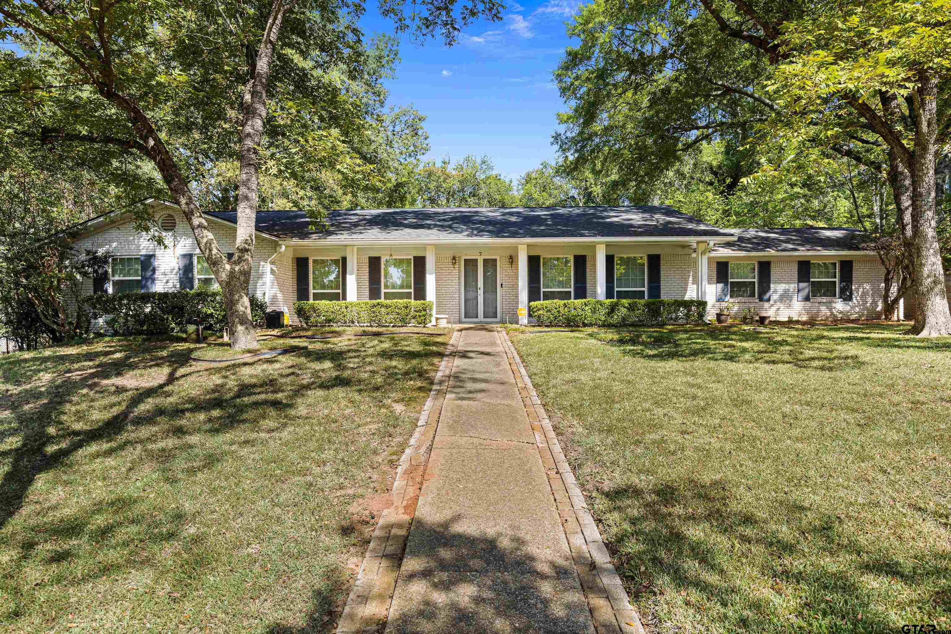 a view of a house with a patio