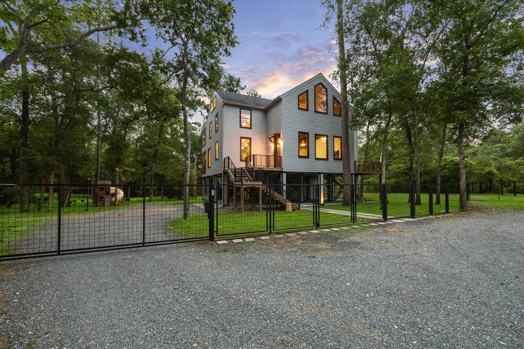 a view of a house next to a yard