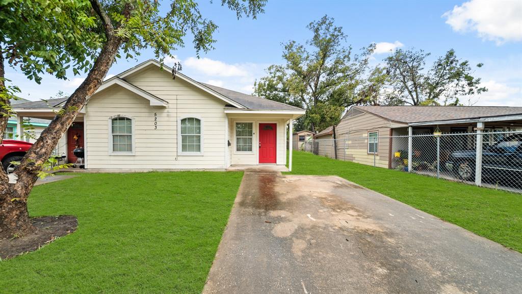 a view of outdoor space yard and front view of a house