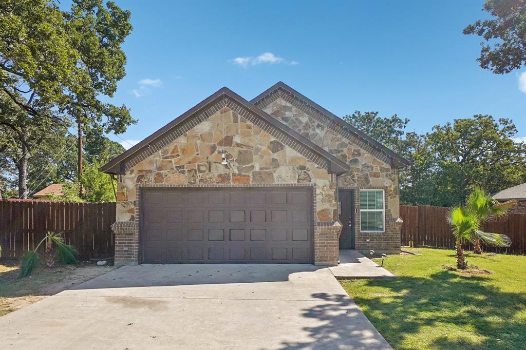 a view of outdoor space yard and garage