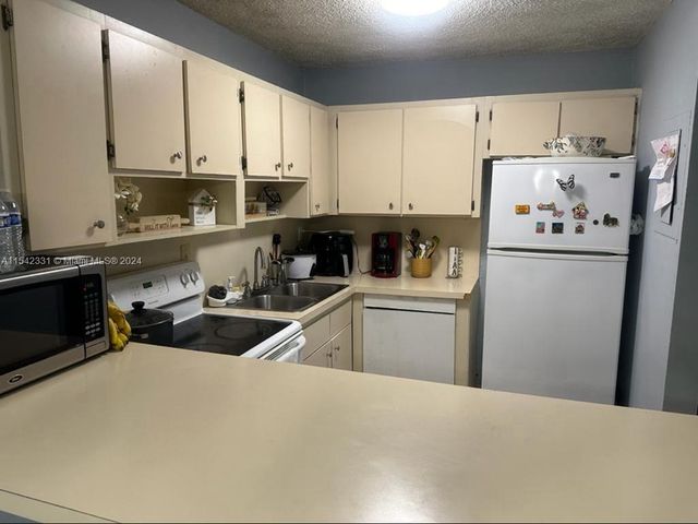 $275,000 | 6095 West 19th Avenue, Unit 403 | Hialeah