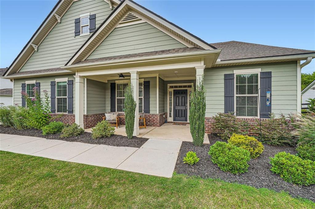 front view of a house and a yard