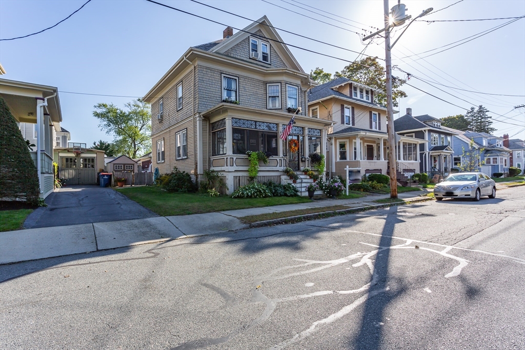 a front view of a building with street view