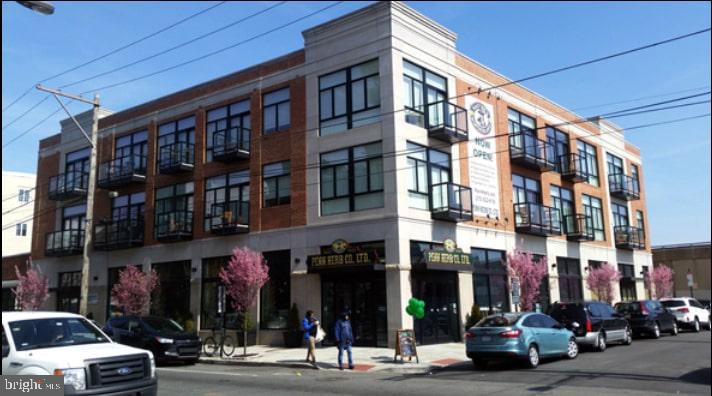 a view of a building and a street