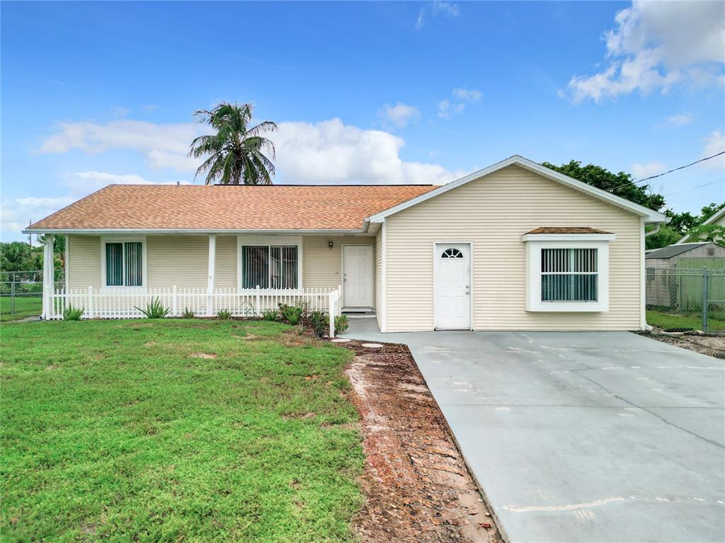 front view of a house with a yard