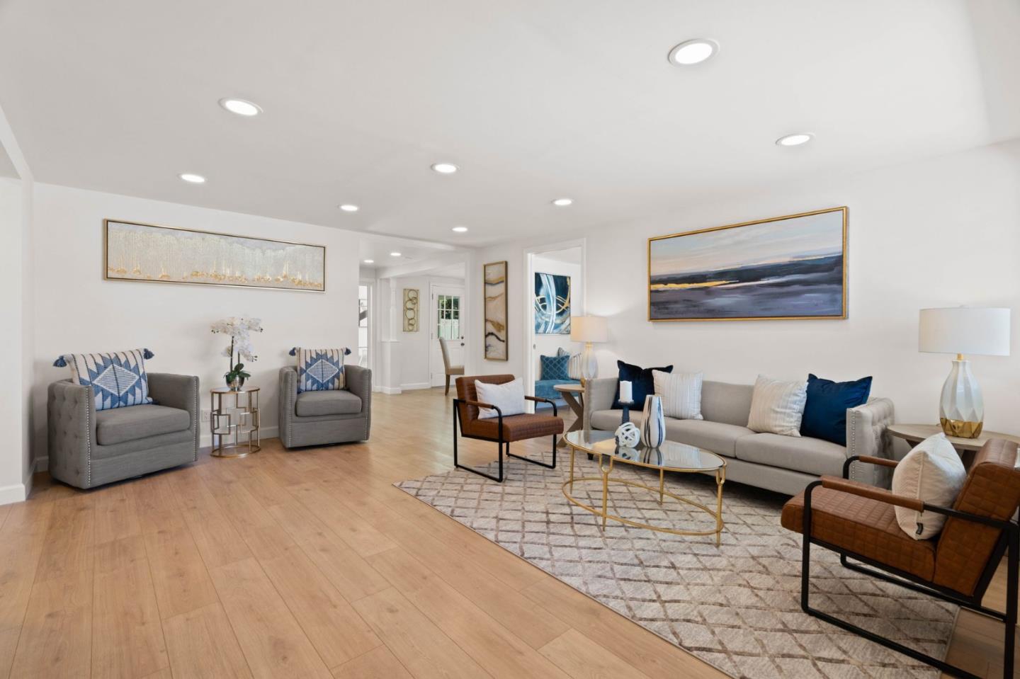 a living room with furniture and a rug