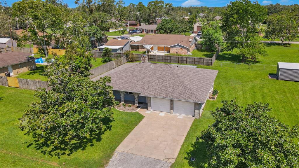 a aerial view of a house with garden