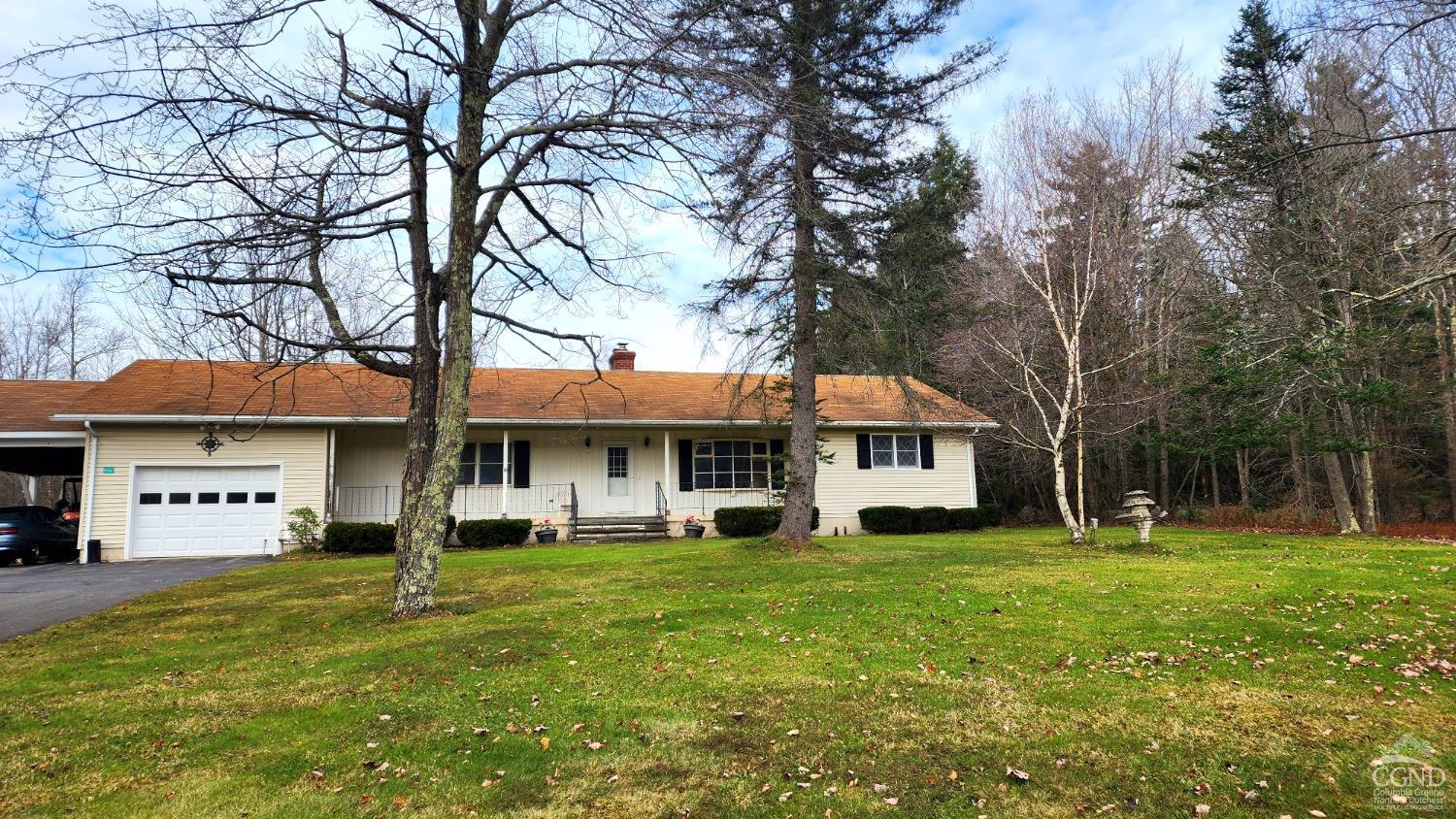 a house with trees in the background