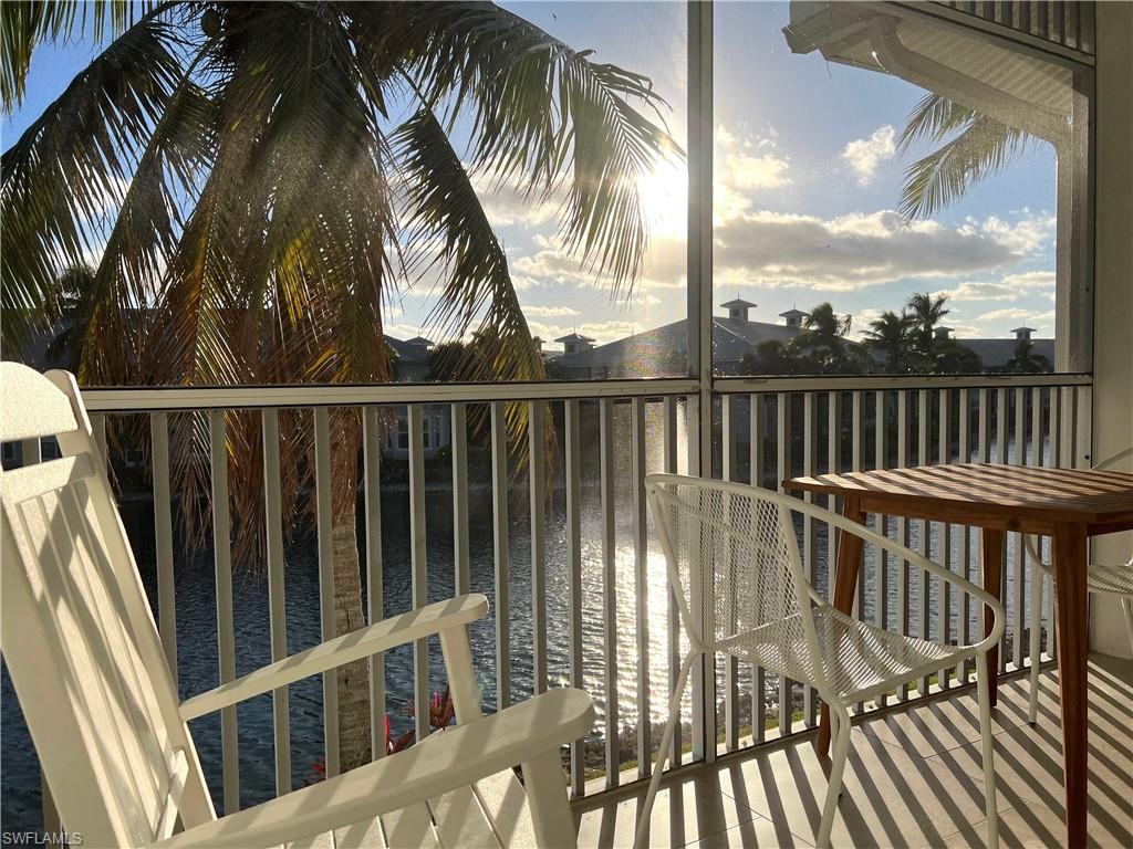 a view of balcony with furniture