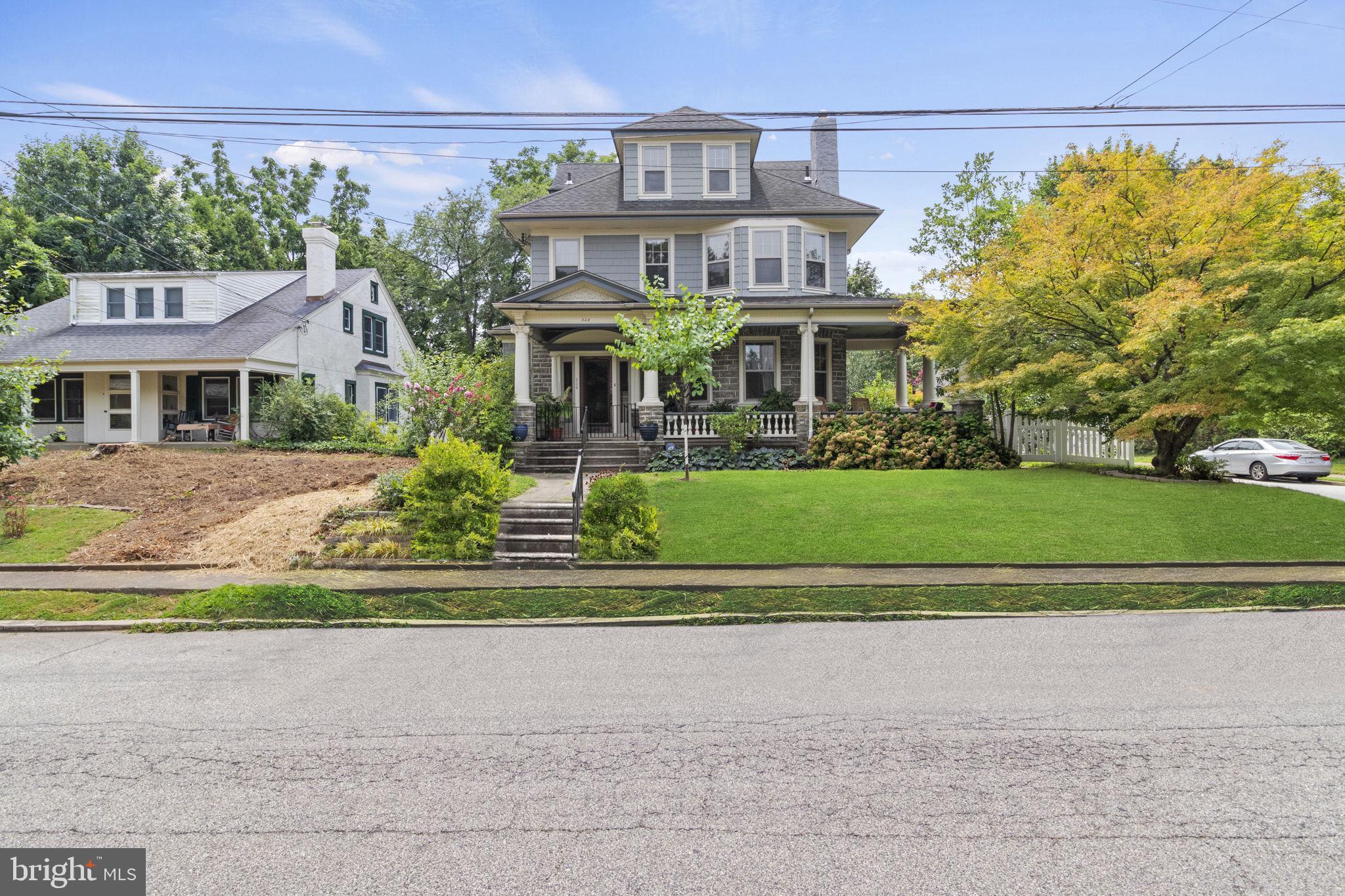 front view of a house with a garden