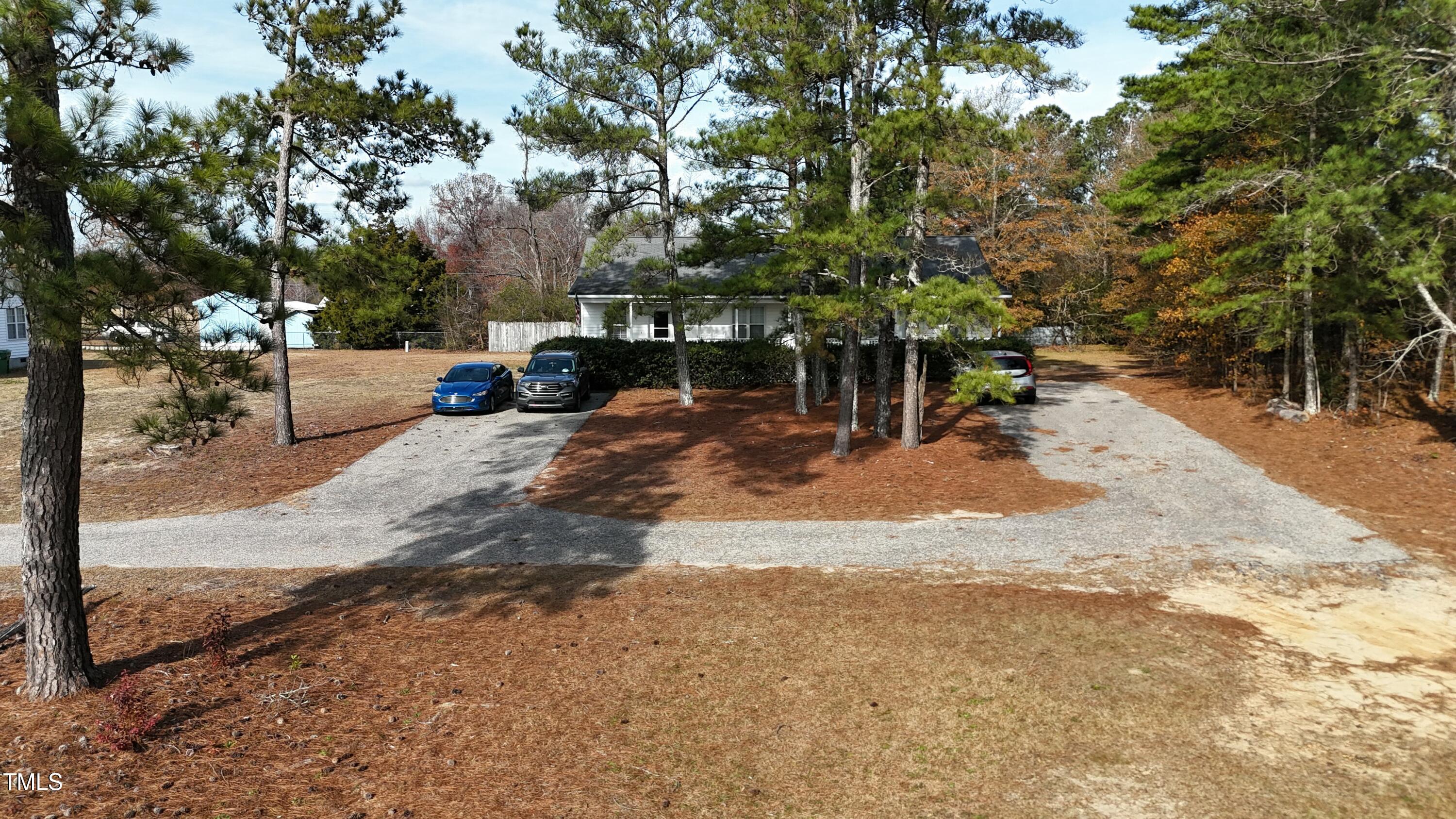 a view of yard with patio