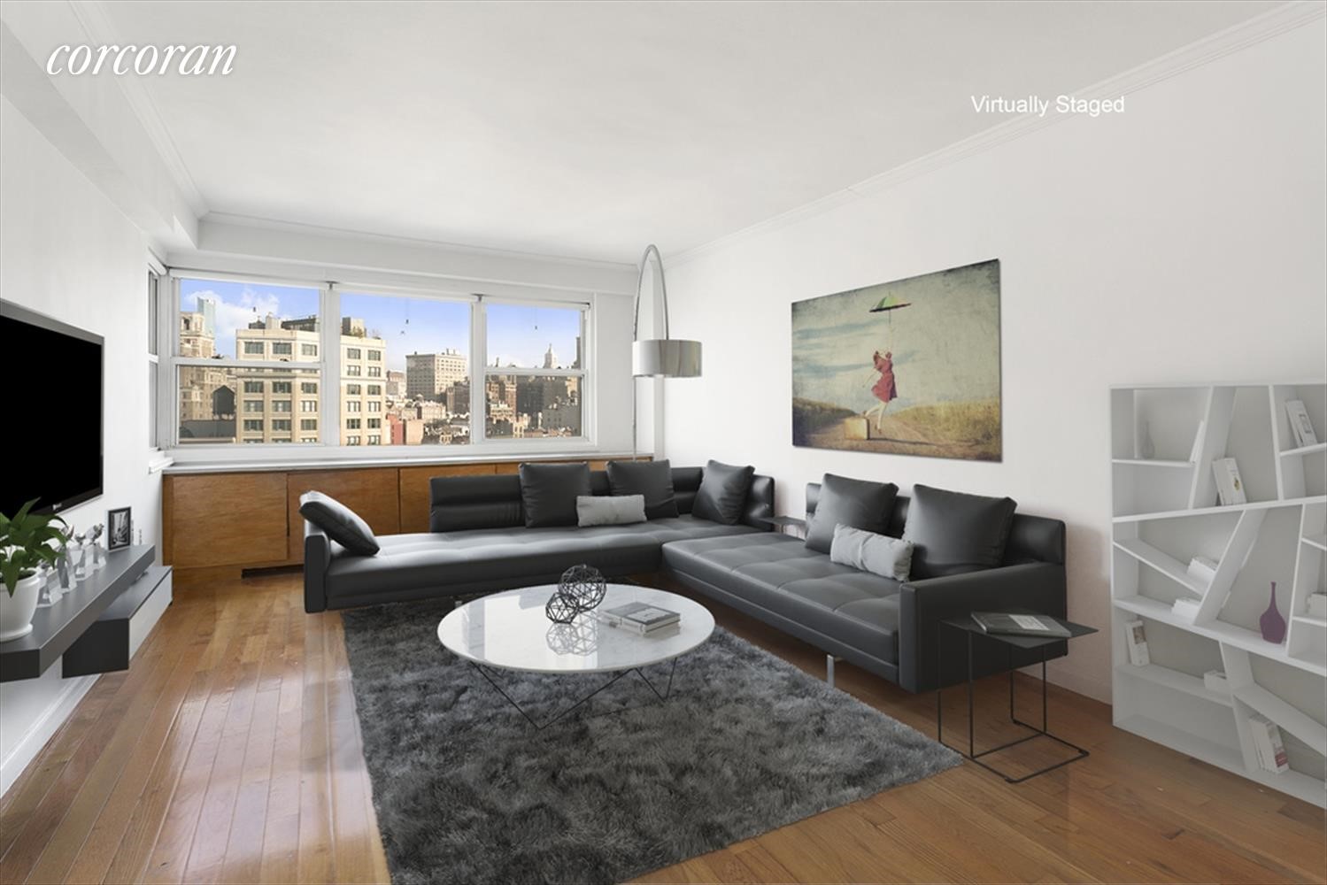 a living room with furniture and a flat screen tv