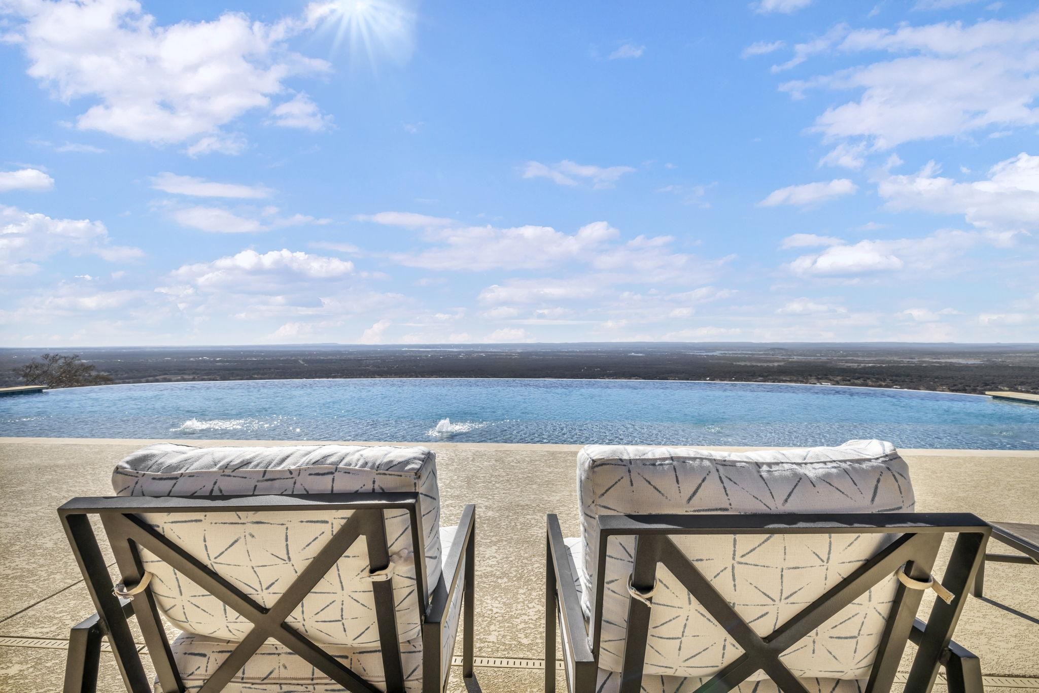 a view of a terrace with table and chairs