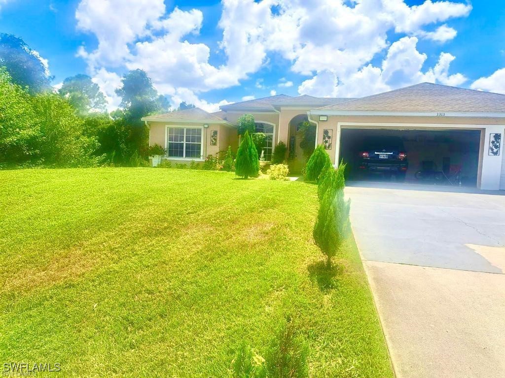 a front view of house with yard