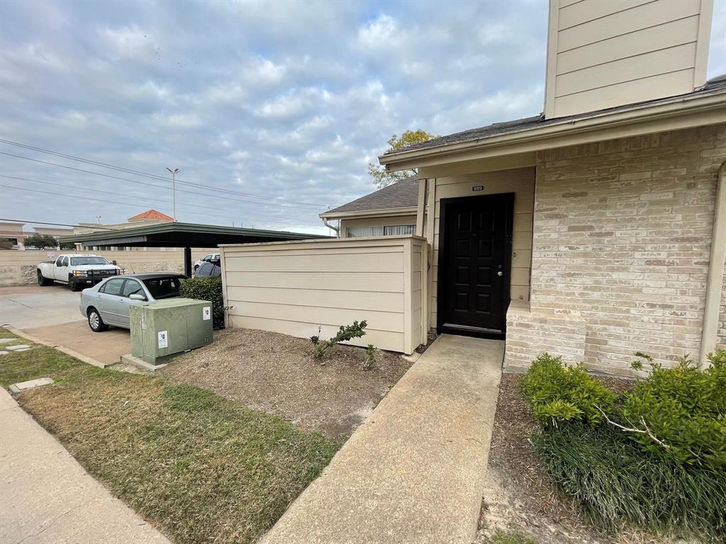 a front view of a house with garage