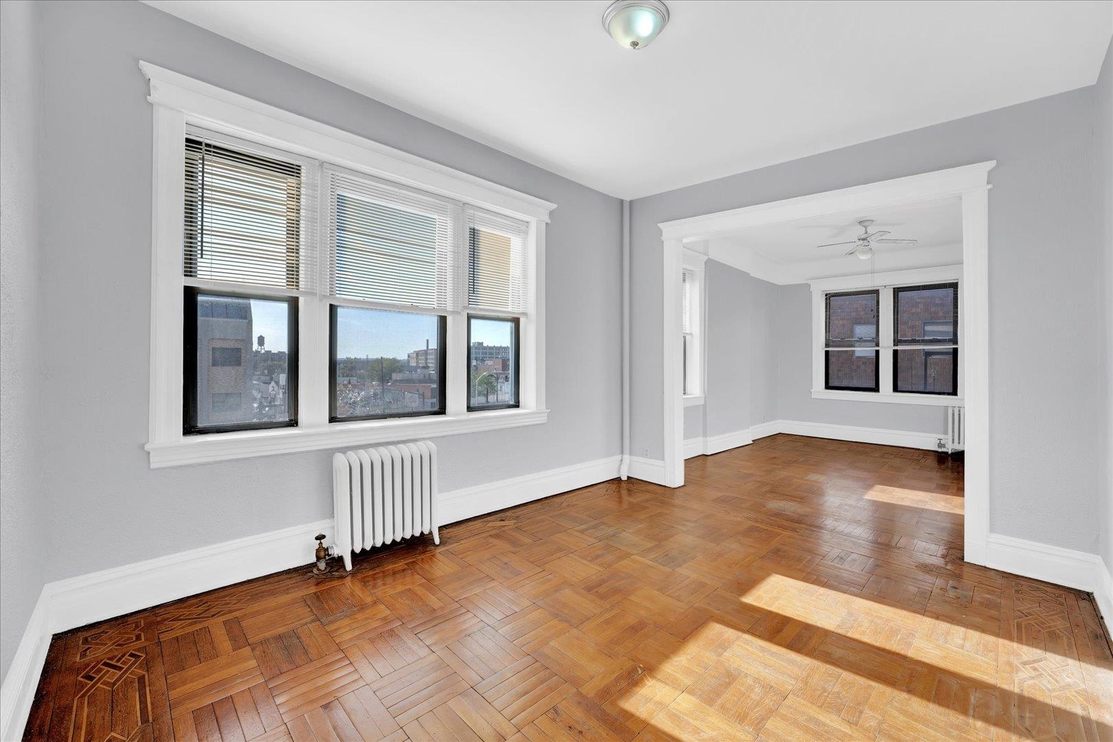 a view of an empty room with a window